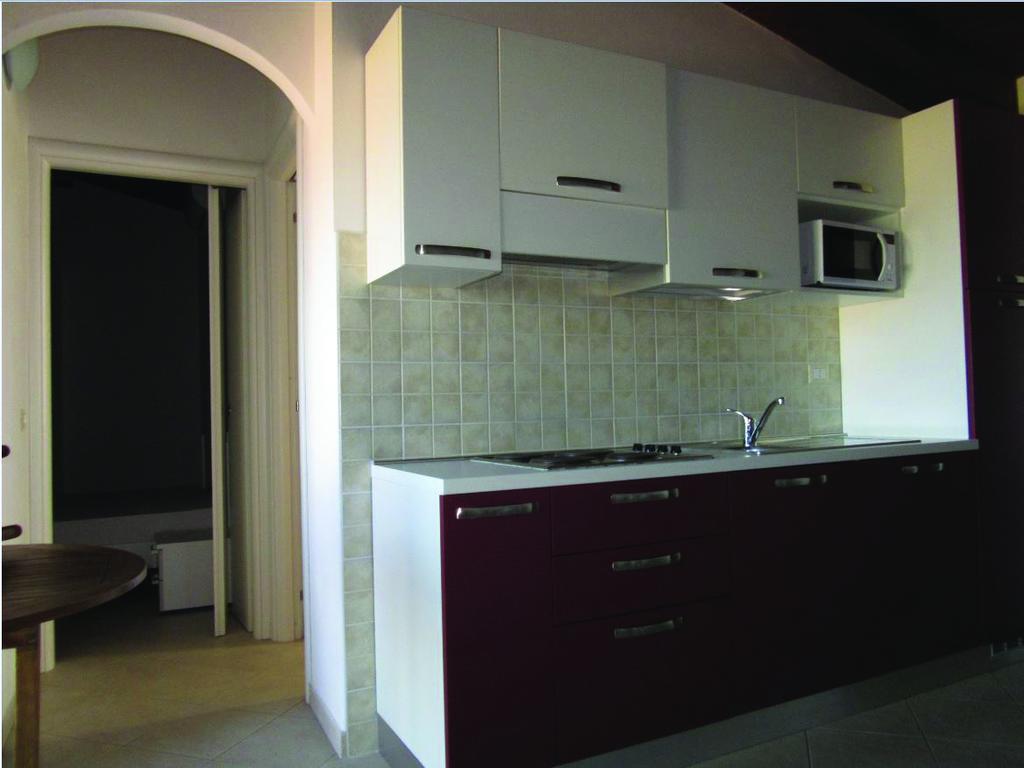Residence L'Incanto Attici Кастелсардо Екстериор снимка