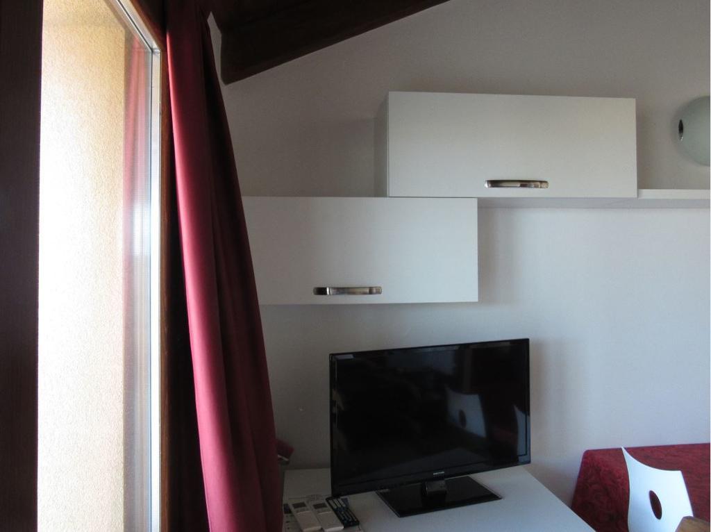 Residence L'Incanto Attici Кастелсардо Екстериор снимка