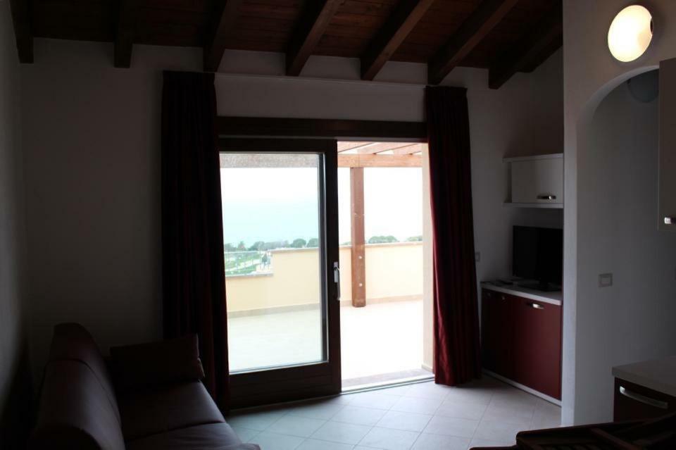 Residence L'Incanto Attici Кастелсардо Екстериор снимка