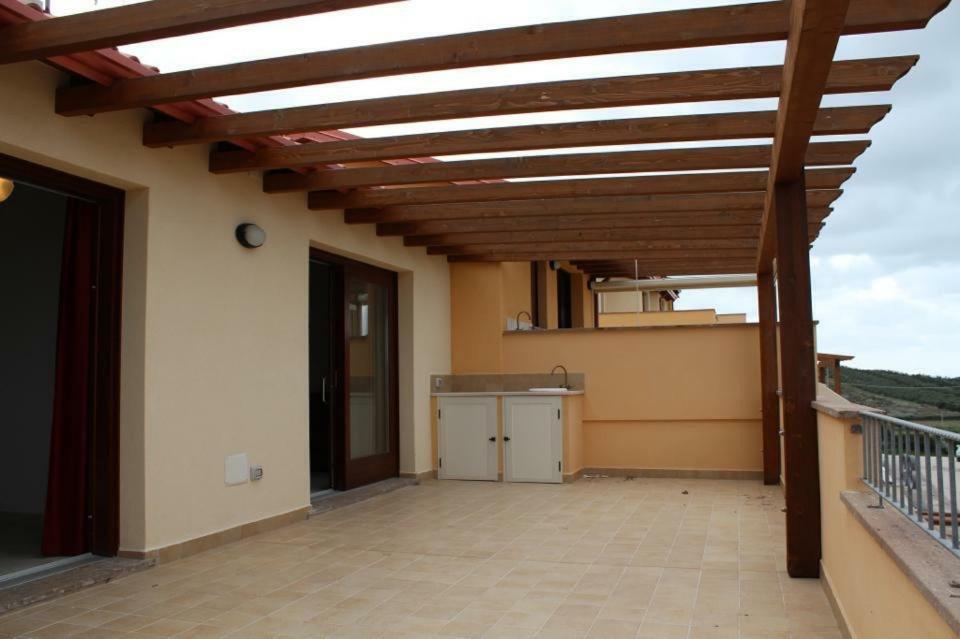 Residence L'Incanto Attici Кастелсардо Екстериор снимка